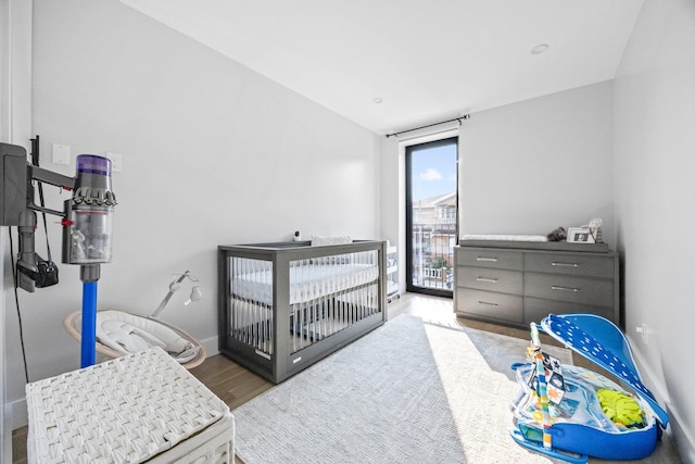 2539 48th St, Astoria, NY 11103 - bedroom featuring wood finished floors and vaulted ceiling