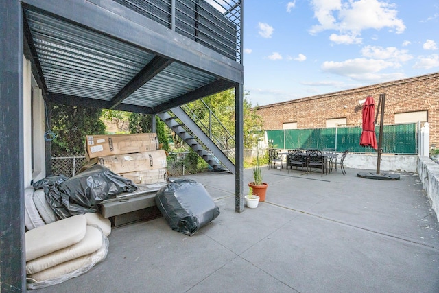 2539 48th St, Astoria, NY 11103 - view of patio / terrace with outdoor dining area and stairway