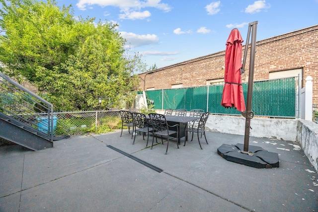 2539 48th St, Astoria, NY 11103 - fenced backyard with a patio area and outdoor dining area
