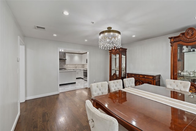 487 W Central Ave Unit 112, Spring Valley, NY 10977 - dining area featuring a chandelier, wood finished floors, and recessed lighting