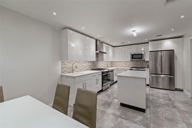 487 W Central Ave Unit 112, Spring Valley, NY 10977 - kitchen with stainless steel appliances, modern cabinets, tasteful backsplash, light marble finish flooring, and recessed lighting