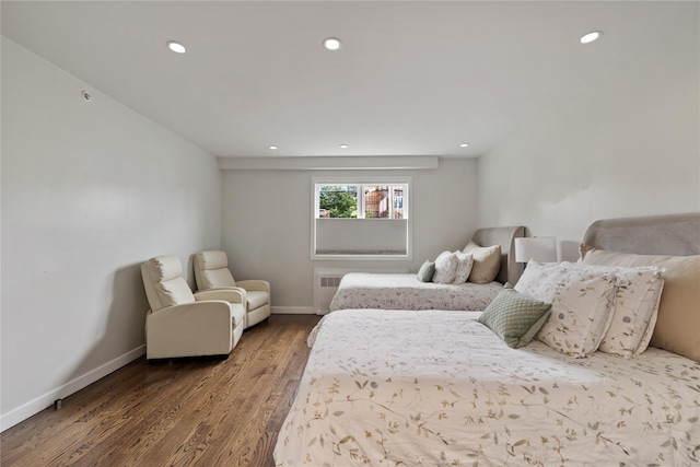 487 W Central Ave Unit 112, Spring Valley, NY 10977 - bedroom featuring wood finished floors, recessed lighting, and radiator