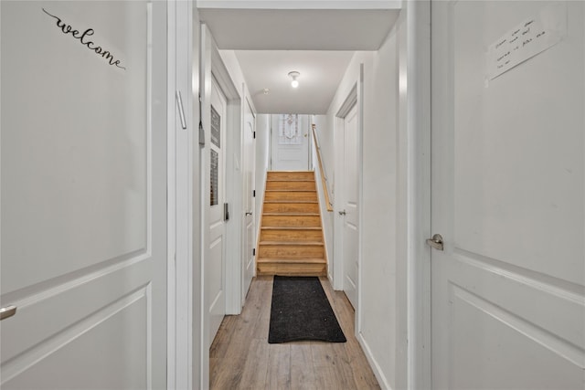 487 W Central Ave Unit 112, Spring Valley, NY 10977 - corridor with light wood-type flooring and stairway