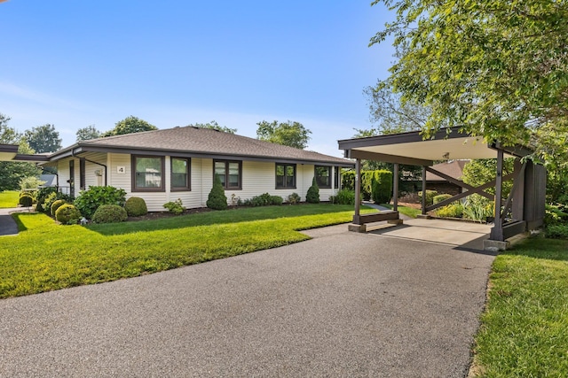 4 Devon Ct Unit B, Yorktown Heights, NY 10598 - view of front of property featuring a front yard and roof with shingles