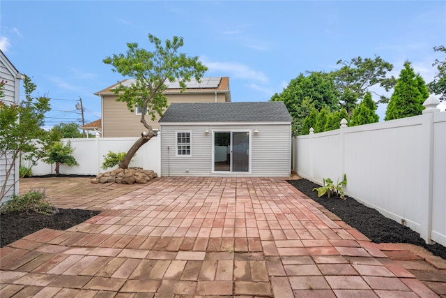 204 Leonard St, North Bellmore, NY 11710 - fenced backyard with a patio and an outbuilding