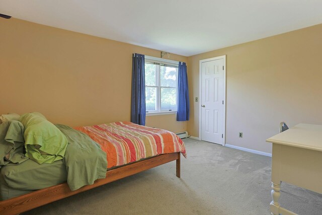 328 Willis Ave, Hawthorne, NY 10532 - bedroom with baseboard heating and light carpet