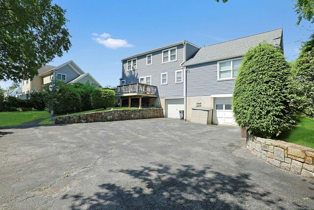 328 Willis Ave, Hawthorne, NY 10532 - rear view of property with a garage and driveway