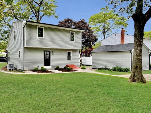 49 Heston Rd, Shirley, NY 11967 - rear view of house with a yard