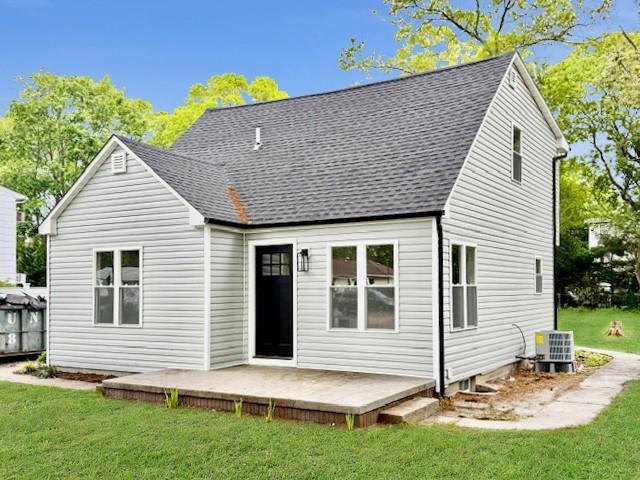 49 Heston Rd, Shirley, NY 11967 - back of house featuring roof with shingles, a yard, and a wooden deck
