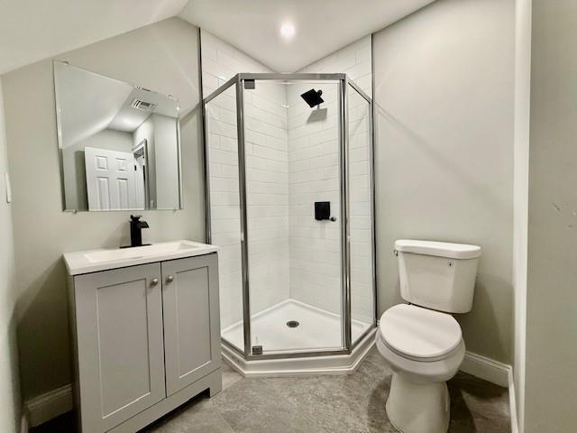 49 Heston Rd, Shirley, NY 11967 - full bathroom with vanity, a stall shower, and vaulted ceiling