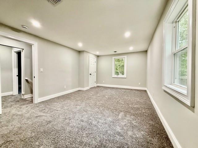 49 Heston Rd, Shirley, NY 11967 - carpeted empty room featuring recessed lighting
