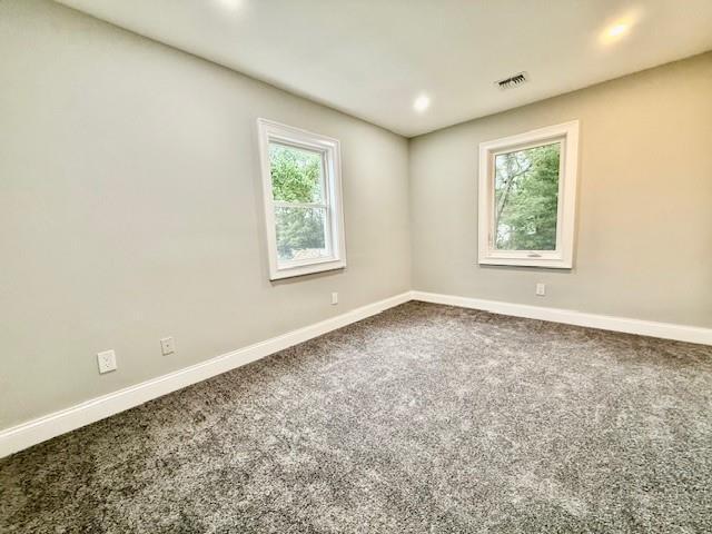 49 Heston Rd, Shirley, NY 11967 - spare room featuring carpet flooring and recessed lighting