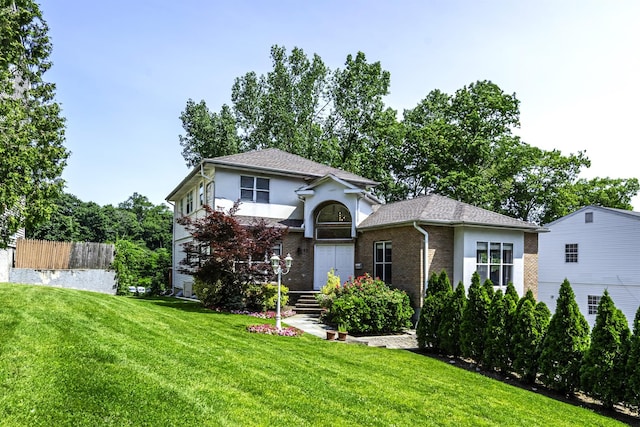 53 Vista Hill Rd, Great Neck, NY 11021 - view of front of property featuring stucco siding and brick siding