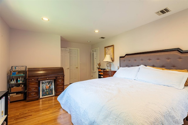 53 Vista Hill Rd, Great Neck, NY 11021 - bedroom with light wood-style floors and recessed lighting