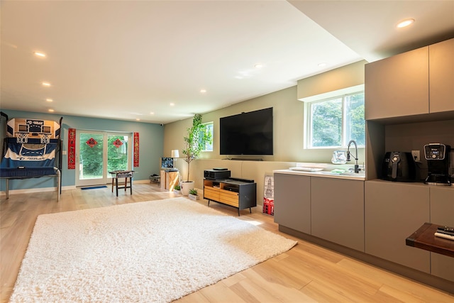 53 Vista Hill Rd, Great Neck, NY 11021 - living room with healthy amount of natural light, light wood finished floors, and recessed lighting