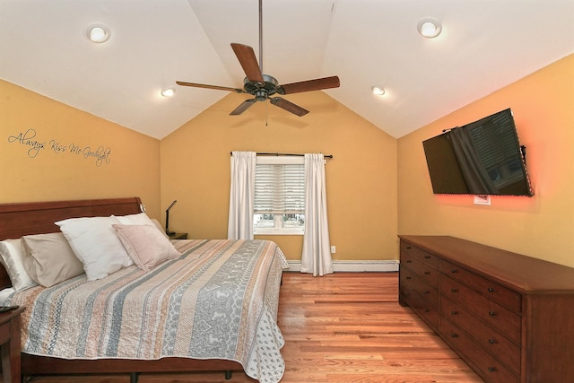 250 33rd St, Lindenhurst, NY 11757 - bedroom featuring light wood-style flooring, vaulted ceiling, recessed lighting, a baseboard heating unit, and a ceiling fan