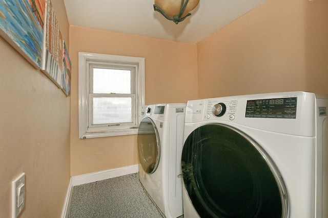 250 33rd St, Lindenhurst, NY 11757 - washroom featuring baseboards and separate washer and dryer