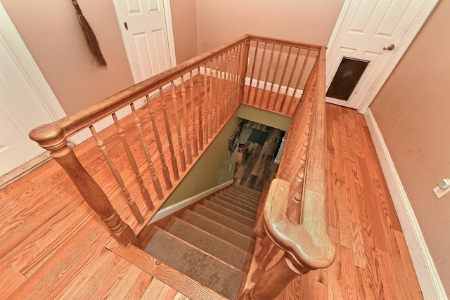 250 33rd St, Lindenhurst, NY 11757 - staircase featuring wood finished floors