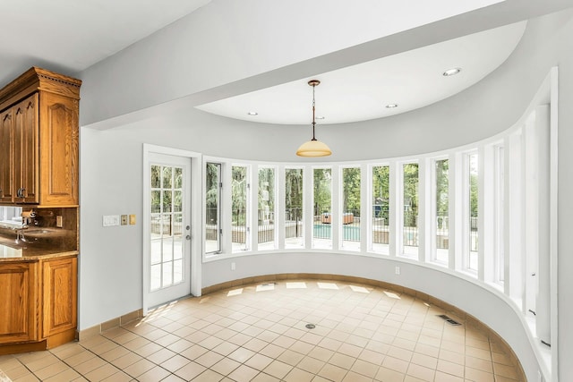 12 Orient Ave, Northport, NY 11768 - unfurnished dining area with healthy amount of natural light, light tile patterned flooring, and recessed lighting