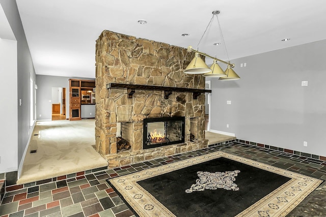 12 Orient Ave, Northport, NY 11768 - unfurnished living room featuring baseboards and a stone fireplace