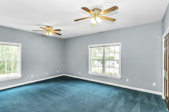 12 Orient Ave, Northport, NY 11768 - spare room featuring dark carpet and a ceiling fan