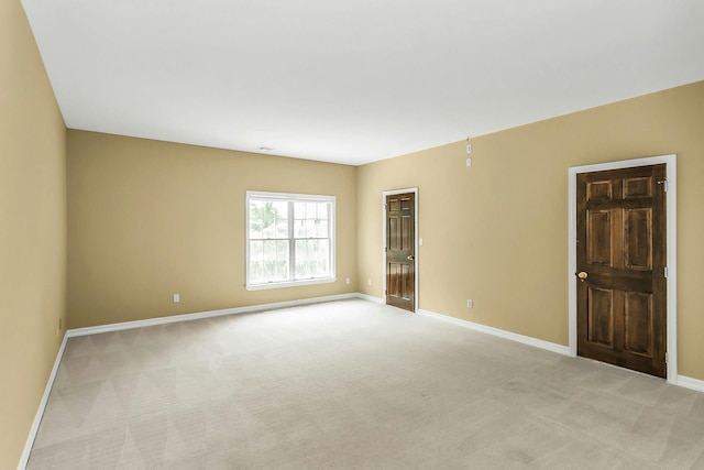 12 Orient Ave, Northport, NY 11768 - spare room with light colored carpet and baseboards