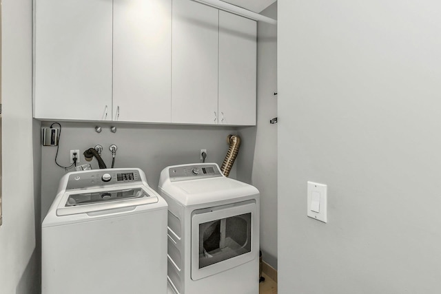 12 Orient Ave, Northport, NY 11768 - laundry area with independent washer and dryer and cabinet space