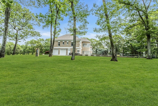 12 Orient Ave, Northport, NY 11768 - view of grassy yard featuring an attached garage