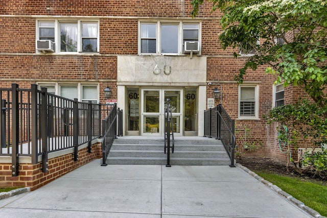 60 Knolls Cres Unit 1F, Bronx, NY 10463 - property entrance with cooling unit and brick siding