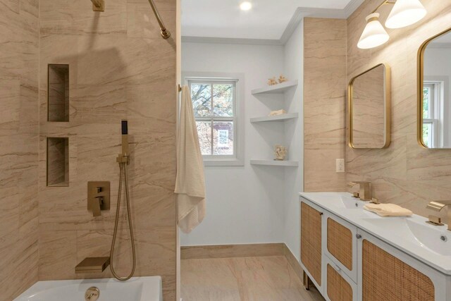 115 River Rd, Nyack, NY 10960 - full bathroom with double vanity, crown molding, marble look tile flooring, and washtub / shower combination