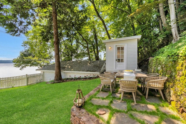 115 River Rd, Nyack, NY 10960 - view of yard featuring outdoor dining space and an outdoor structure