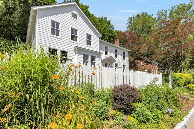 115 River Rd, Nyack, NY 10960 - view of front facade with a chimney