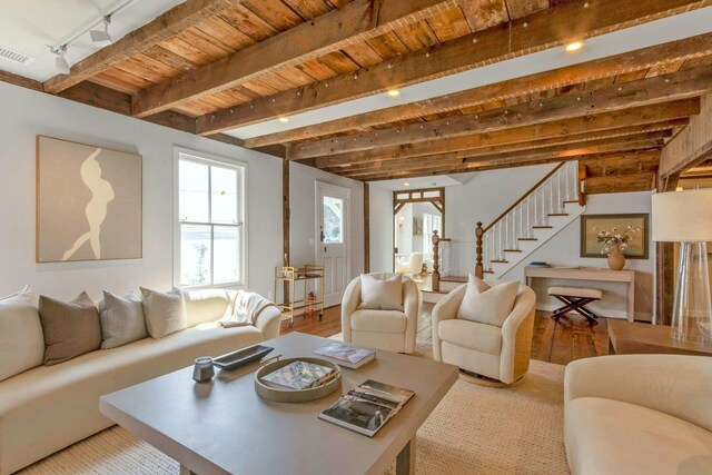 115 River Rd, Nyack, NY 10960 - living area with rail lighting, wood finished floors, stairs, and a wood ceiling with exposed beams