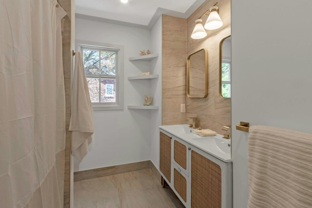 115 River Rd, Nyack, NY 10960 - full bath with marble finish flooring, double vanity, ornamental molding, and a shower with curtain
