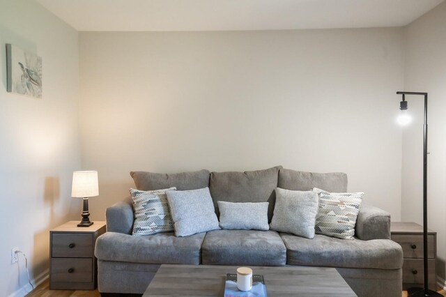 1000 Ninth St Unit H63, Greenport, NY 11944 - living area with light wood-type flooring and baseboards