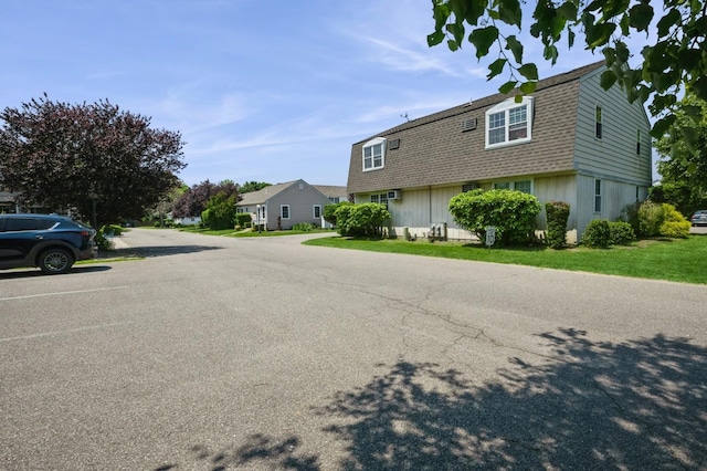 1000 Ninth St Unit H63, Greenport, NY 11944 - view of asphalt street featuring a residential view
