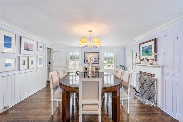 50 Shore Rd, Cold Spring Harbor, NY 11724 - dining space featuring a chandelier, crown molding, and dark wood-style floors