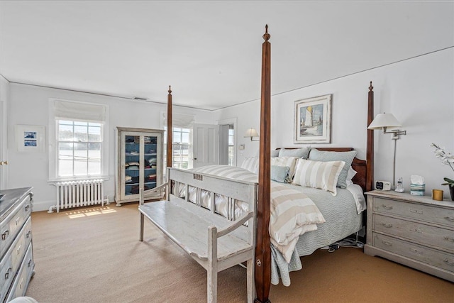 50 Shore Rd, Cold Spring Harbor, NY 11724 - bedroom featuring radiator heating unit and light colored carpet