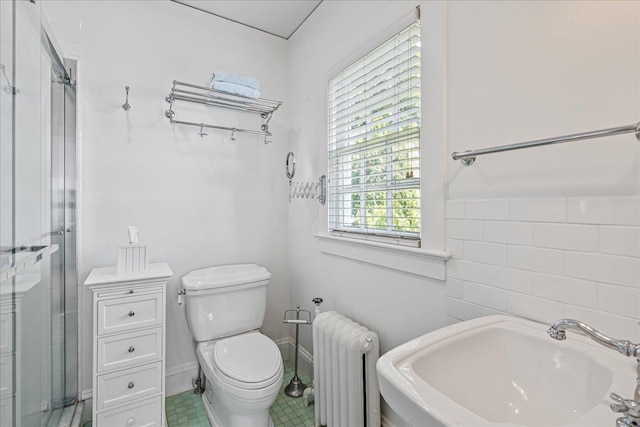 50 Shore Rd, Cold Spring Harbor, NY 11724 - full bathroom featuring radiator, a shower stall, and tile walls