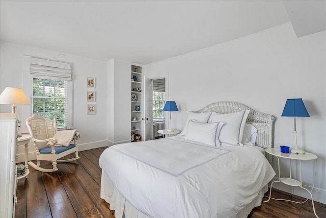 50 Shore Rd, Cold Spring Harbor, NY 11724 - bedroom with dark wood-style flooring and radiator