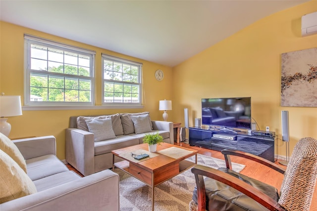 3 Twig Ct, East Setauket, NY 11733 - living room featuring healthy amount of natural light, wood finished floors, vaulted ceiling, and a wall mounted AC