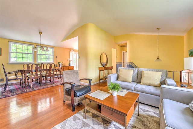 3 Twig Ct, East Setauket, NY 11733 - living area featuring light wood-style flooring and lofted ceiling