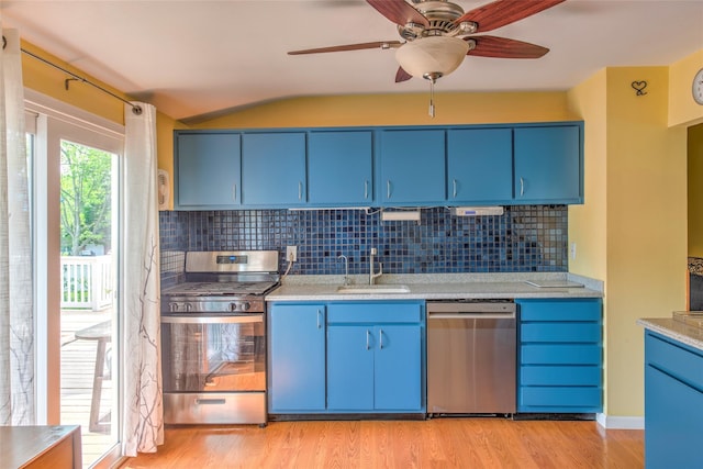 3 Twig Ct, East Setauket, NY 11733 - kitchen featuring appliances with stainless steel finishes, blue cabinetry, light wood finished floors, backsplash, and a ceiling fan