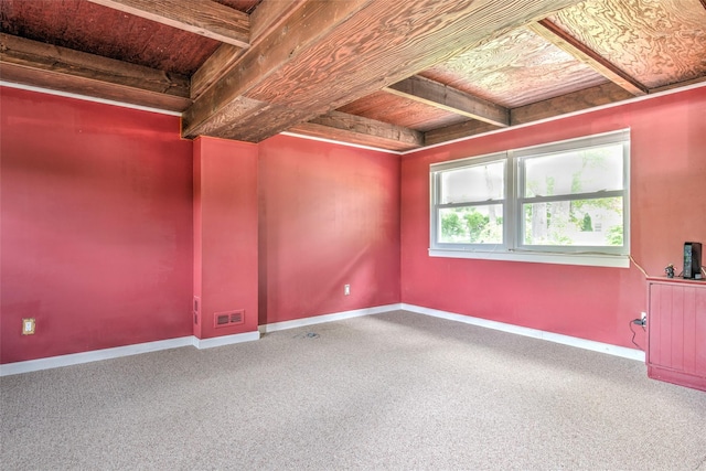 3 Twig Ct, East Setauket, NY 11733 - spare room featuring a wooden ceiling with exposed beams and carpet