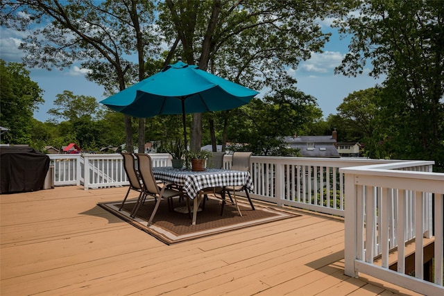 3 Twig Ct, East Setauket, NY 11733 - wooden terrace with outdoor dining area and a grill