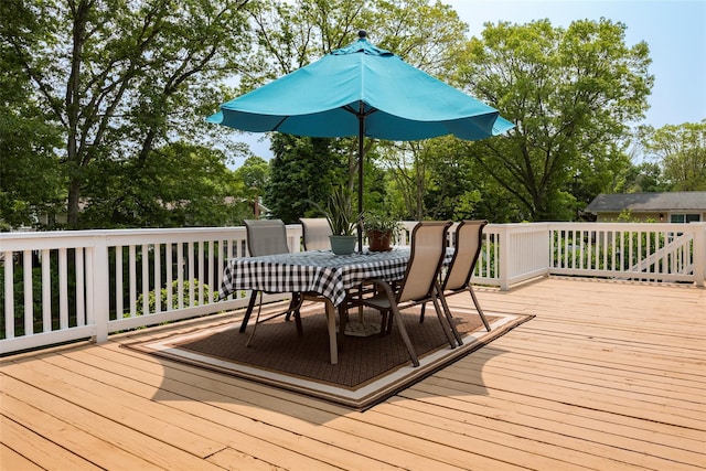 3 Twig Ct, East Setauket, NY 11733 - deck featuring outdoor dining area and view of scattered trees
