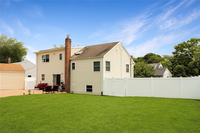 6 Robinhood Dr, East Islip, NY 11730 - back of property with a patio, a chimney, and outdoor lounge area