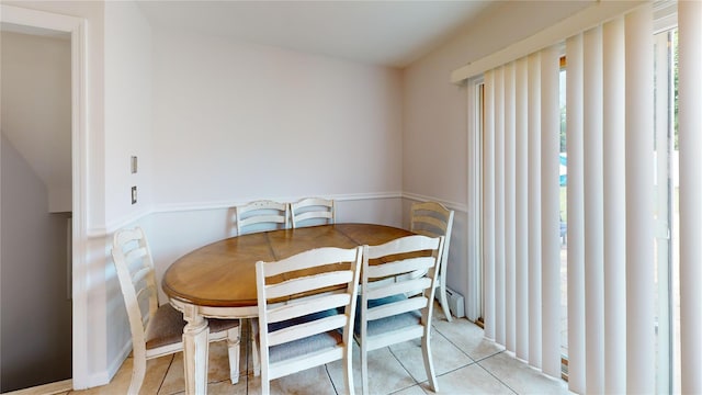 6 Robinhood Dr, East Islip, NY 11730 - dining space with light tile patterned floors