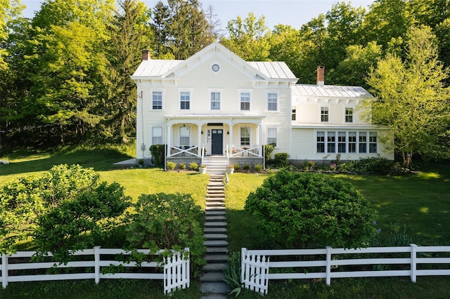132 Decker, Ancram, NY 12502 - italianate house featuring a standing seam roof, stairs, a chimney, and a metal roof