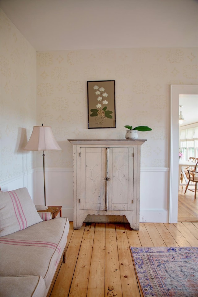 132 Decker, Ancram, NY 12502 - living area with wallpapered walls, wainscoting, and light wood-style flooring